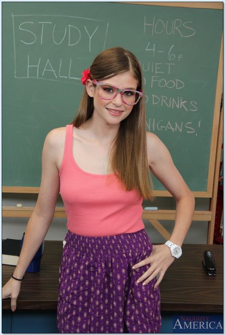 Brunette student Lara Brookes strips and shows her hairy pussy