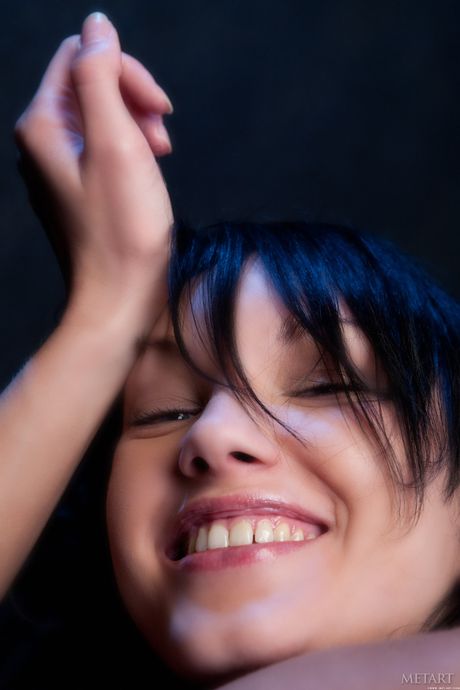 Beautiful teen Loreen A removes her panties to model in the nude