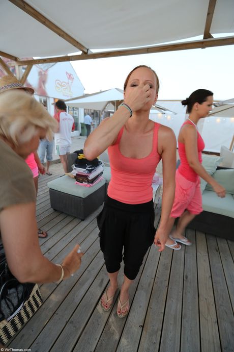 Teen lesbians Jo & Eve Angel get naked on a gym floor during a workout