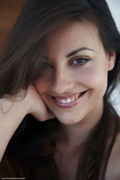 Latina teen Lorena hits upon great nude poses in her bedroom