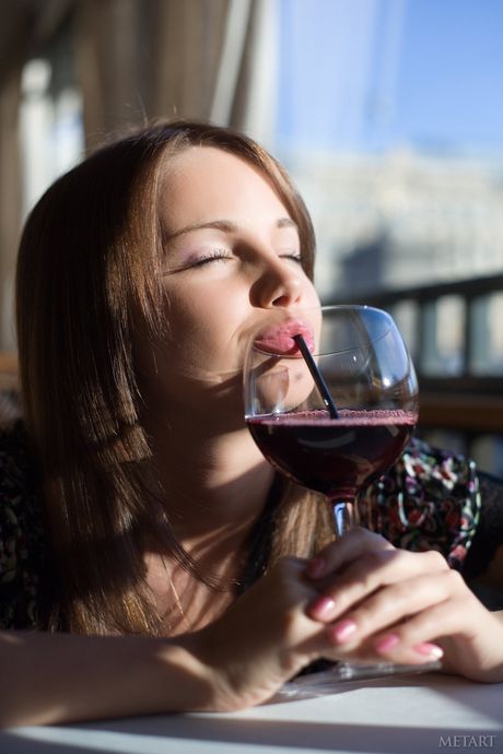 Russian model Michaela A reveals her big tits and shaved pussy in the nude