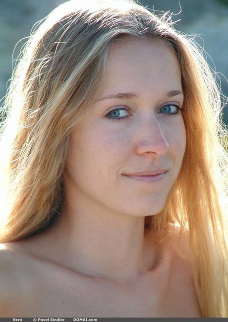 Domai: Skinny blonde Vera shows her small tits and poses naked in a solo