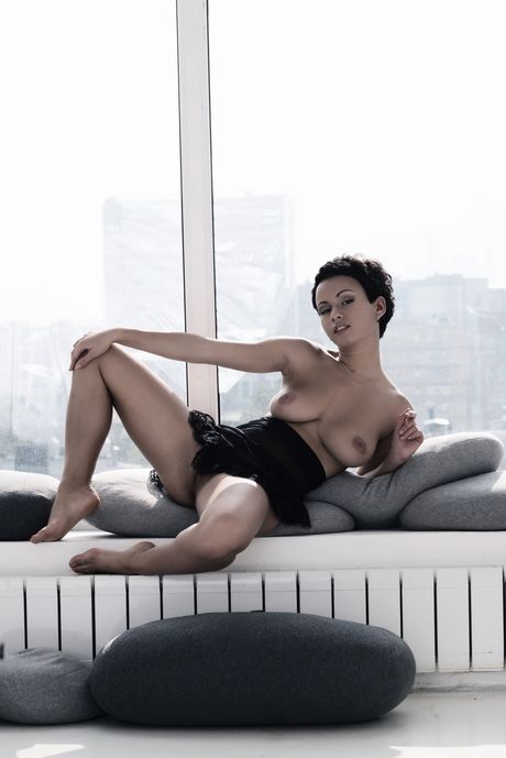 Slender teen Pammie Lee shows her tiny tits and hairy pussy in the nude