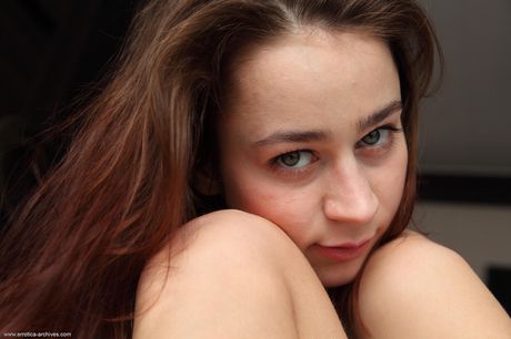 Petite teen Tigra displays her beautiful body while in her bedroom