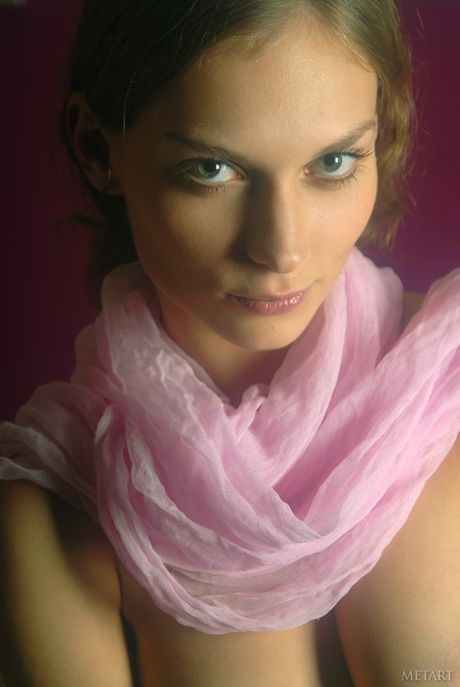 Blonde babe Masha I strips her sexy bikini and poses naked outdoors