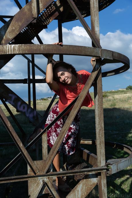 Pretty teen Gracie shows her big tits and poses naked in a secluded spot