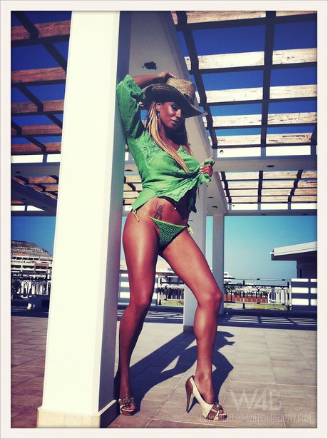 Cute teen Ashley Bulgari shows her small tits and poses in a solo