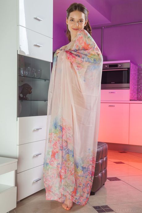 Svelte teen Cherish shows her small tits and poses naked