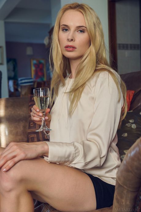 Sexy blonde Maria Rubio takes off her clothes and poses nude in a solo