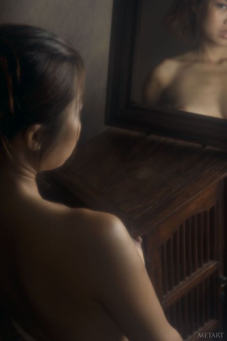 Delicate teen Arielle A gets naked confidently