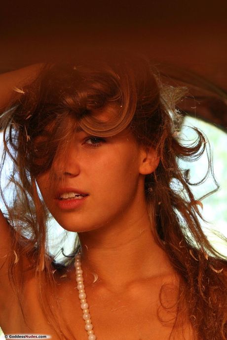 Endearing teen Marya shows her beautiful body and poses naked on a bed