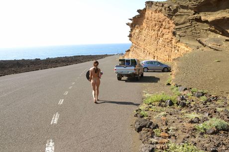 Gorgeous teen Kari A reveals her tiny tits and poses naked in a solo