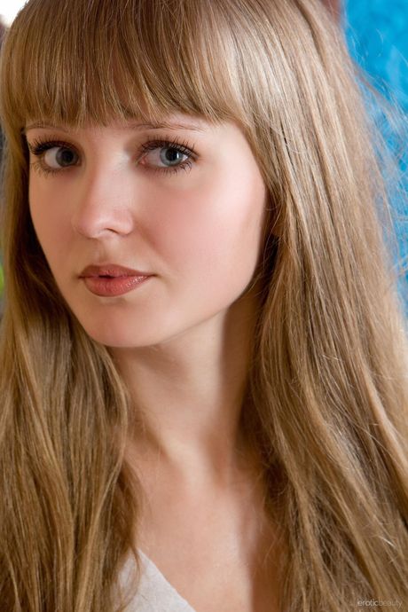 Adorable teen Wendy B strips off her white blouse and nylon stockings Cute