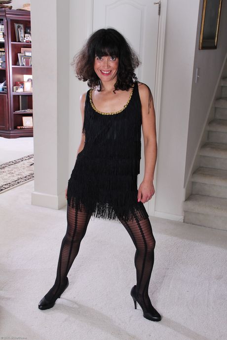 Amateur housewife Echo strips and shows her hot pussy in a sexy bodystocking