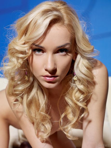 Thin teen Nataly F removes stockings to get totally naked