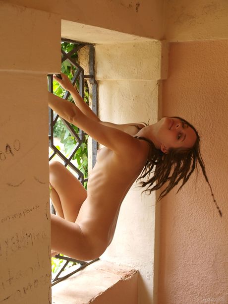 Adorable teen Hanka A poses naked in public and shows her natural tits