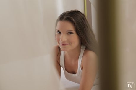 Sexy brunette Anita undresses and masturbates with a vibrator