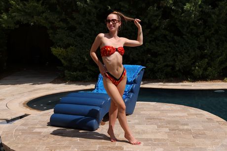 Lean teen Kate Quinn strips & toys her pussy by the pool