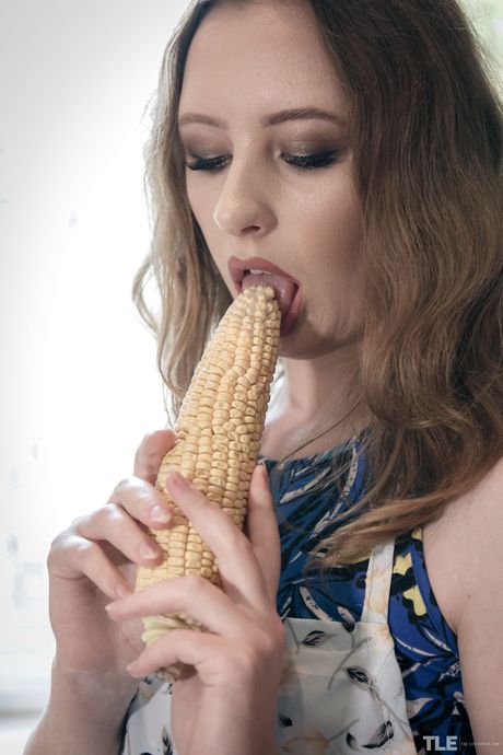 Emma Fantazy strips off her bikini and teases her pussy in the kitchen