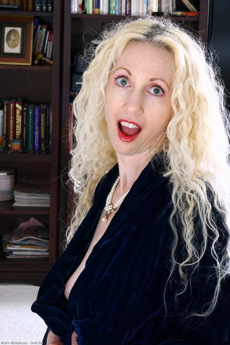 Blonde MILF Lilly shows her big tits and hairy holes in a solo