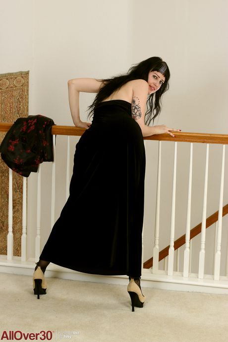 Tall MILF Dot strips to her stockings and shows her hairy pussy up close