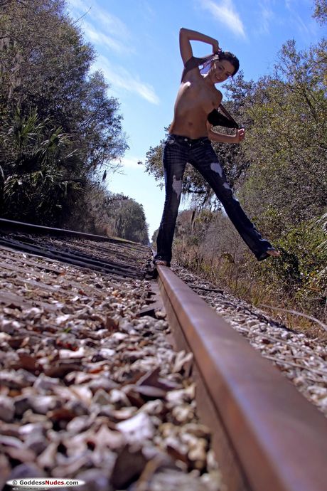 Young blonde Layla goes naked on a patio with self-assuredness