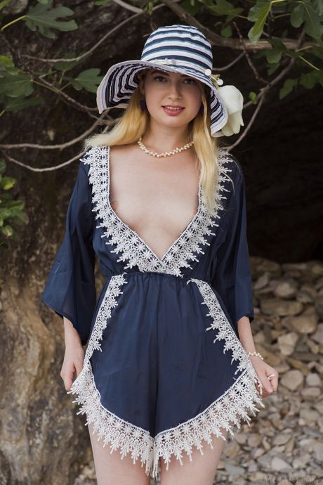 Skinny blonde teen Taylor gets naked on the beach and shows her tiny tits