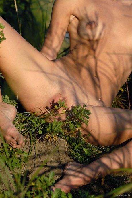 Sexy Russian beautiful Paula B displays her tiny tits and poses naked