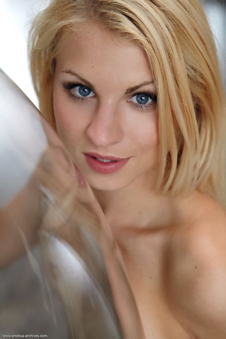 Blonde teen Buccia models completely naked with grace