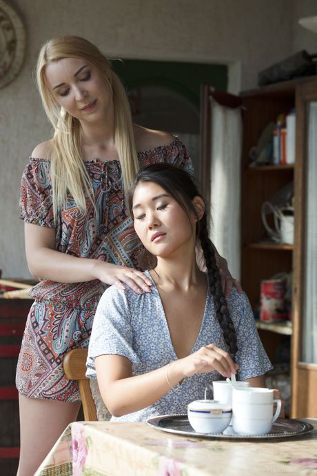 Hot lesbians Katana & Amaris kiss before having sex on a table