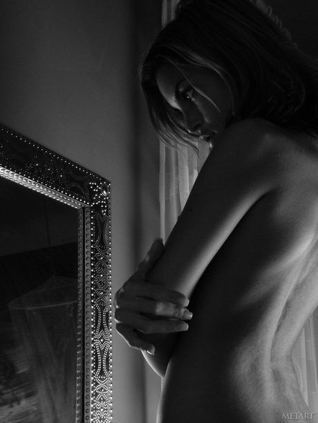 Nella A exhibits her sexy body and pierced pussy