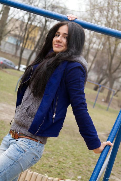 Alluring teen Malina A gets naked in a public place before showing her ass