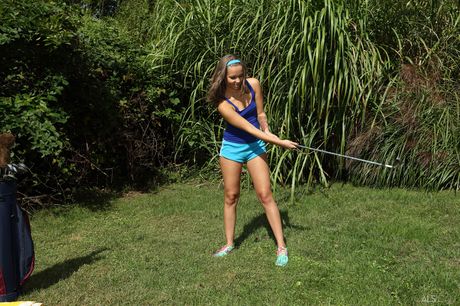 Flexible teen Liza Rowe pisses herself after masturbating with a putter