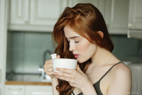 Jia Lissa takes off her green bodysuit and starts masturbating her pussy