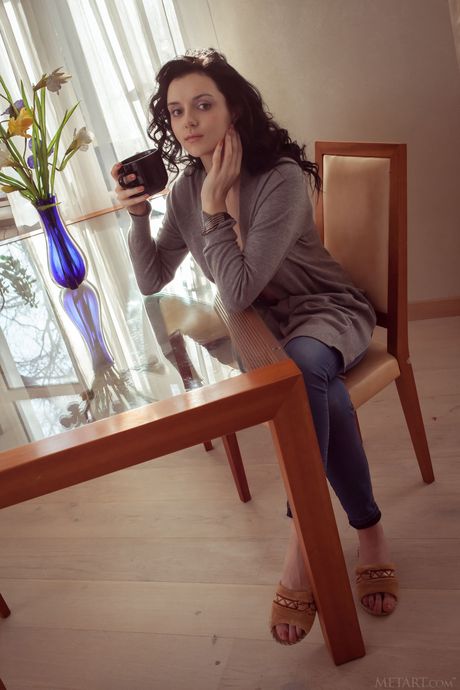 Slender teen Anatali shows her big tits and poses naked