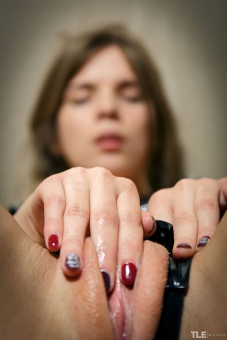 Lean teen Samantha Shain removes her latex lingerie & toes in a solo