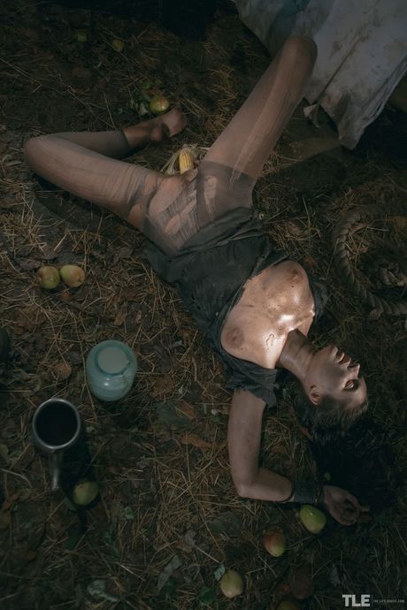 Emily J strips off her ripped pants and highlights her hairy pussy in the bathtub