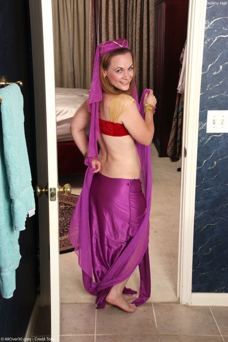 Redheaded chubby Destiny Hall strips and shows her big booty and tits