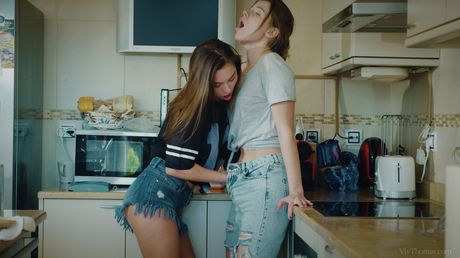 Kalisy & Sabrisse kiss before licking pussies in the kitchen