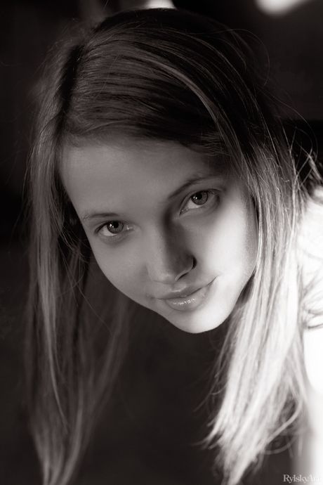 Slender teen Goldie shows off her tiny tits and ass in the nude