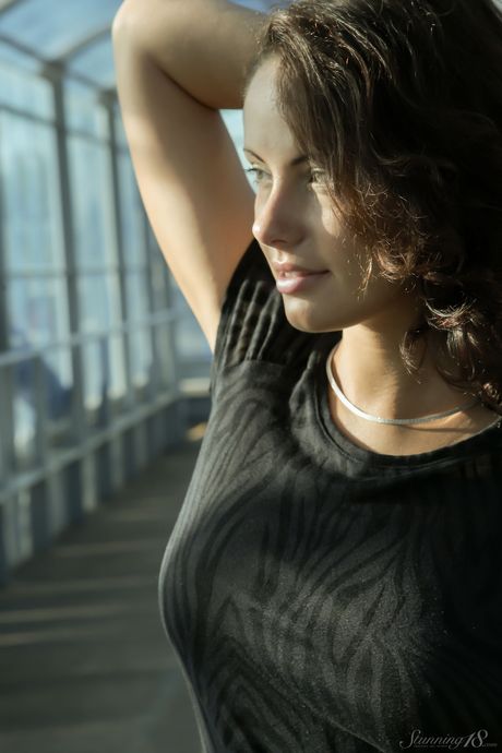 Eunice O takes off everything on a walkway in heels