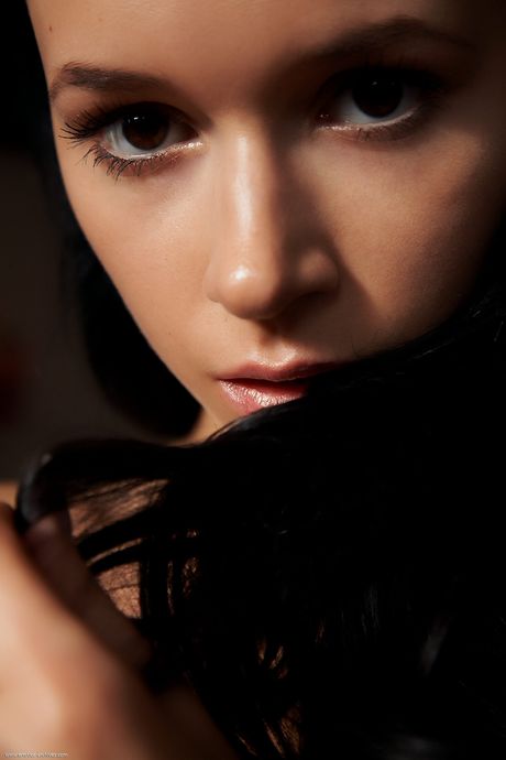 Delicate teen Pia with tiny tits spreading naked to show bald pussy