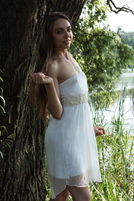 Delicate teen Valery Leche shows her small tits and poses naked