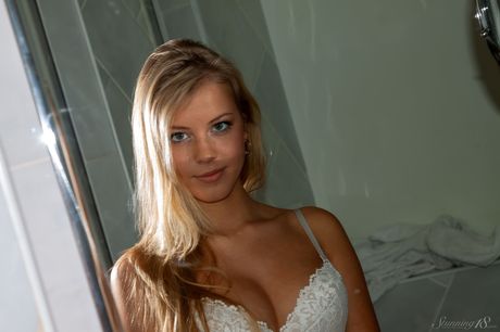 Young beauty Barbara D gets naked in a bathroom while wearing a tiara