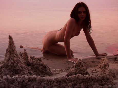 Slender teen Models No Name poses naked in the sandy dunes