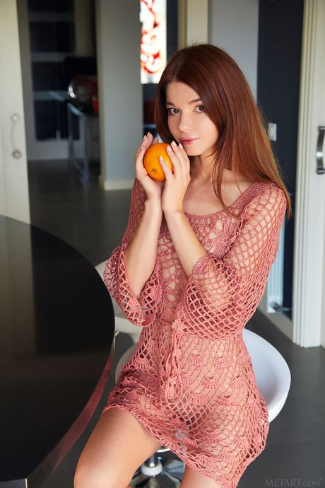 Nedda A removes a mesh dress to get naked in the kitchen