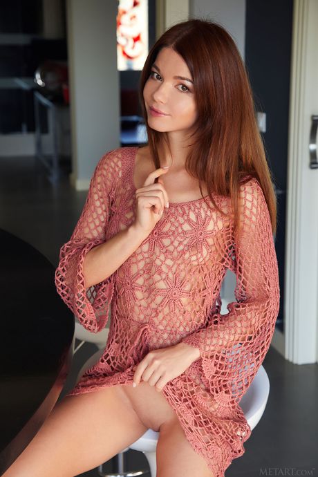 Nedda A removes a mesh dress to get naked in the kitchen