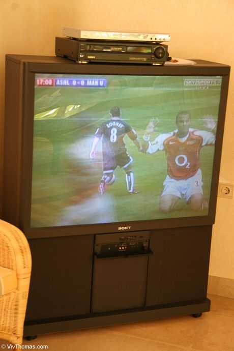 Blonde lesbians Kylie A & Sophie Moon get naked on a beach in sunglasses