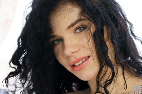 Sweet young girl Kate Rose fingers her pussy after getting naked