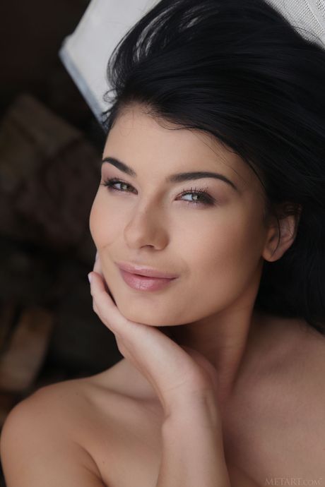 Charming teen Lucy Li showing her big tits & her shaved pussy in the garden